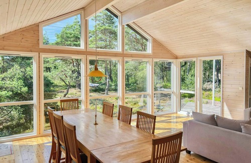 Gressvik House | Family cabin with panoramic windows by Oksrødkilen