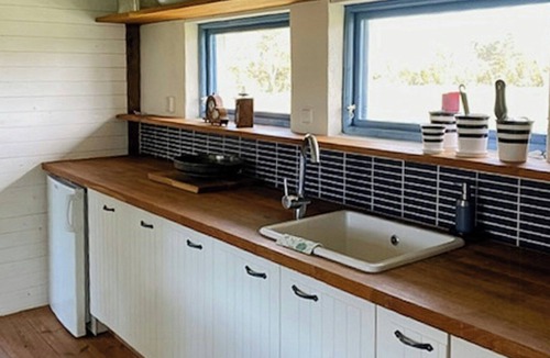 Slite House | Farm on Gotland with fruit trees near harbour
