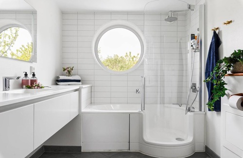 Gottskar House | First-class family accommodations with ocean views, a hot tub, and kayaks. Seats for 10.