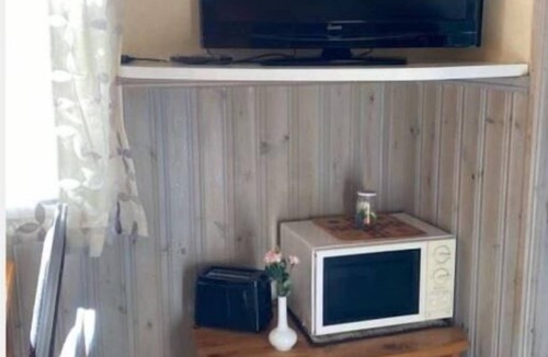 Ramsjo House | Fiska och bo på Ramsjö camping i stor timmerstuga