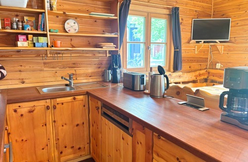 Ydre Municipality House | Fjällstugan – Lakeside Holiday Home with Sauna, Natural Pool & Boat in Ydre, Öst