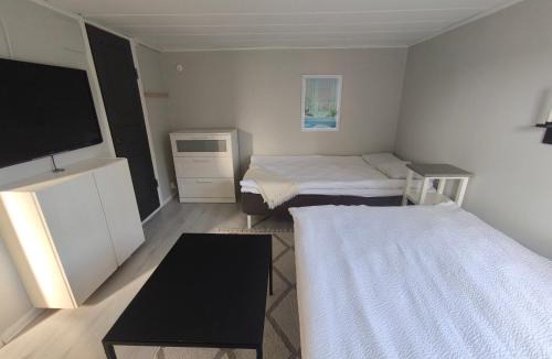 Falkenberg House | Gäststuga med altan i centrala Falkenberg