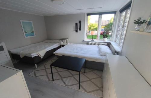 Falkenberg House | Gäststuga med altan i centrala Falkenberg