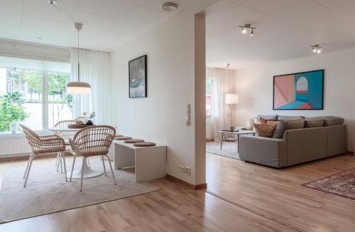 Lulea Villa | Guestly Homes - Modern 4BR Town House, Sauna, 7 Beds