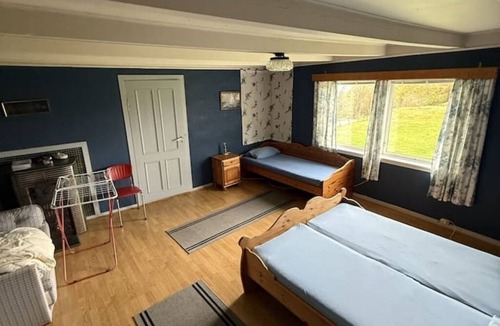Nedstrand House | Helland Farm: A 300-Year-Old Retreat at the Edge of the Fjord