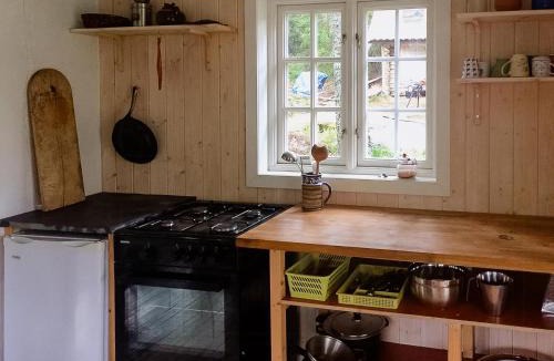 Eidsberg House | Historic Forest Cabin By Lake Steinsvannet