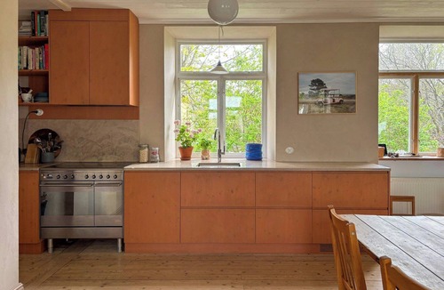 Slite House | Historic limestone school by Boge church