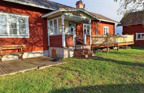 Boda Kyrkby House | Holiday Home Hjortgården Stuga by Interhome