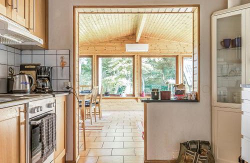 Fjalkinge House | Holiday Home Kjuge Gula Huset by Interhome