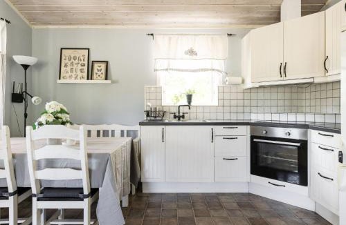 Kalvsvik House | Holiday Home Skärvudde Huset by Interhome