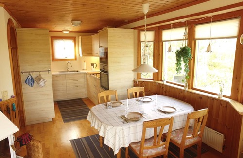 Tived House | Holiday home Tived - directly on lake, sauna, boat, hot tub