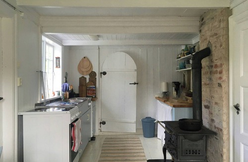 Farsund House | Idyllic farmhouse from 1840 with sea view in Spind