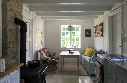 Farsund House | Idyllic farmhouse from 1840 with sea view in Spind