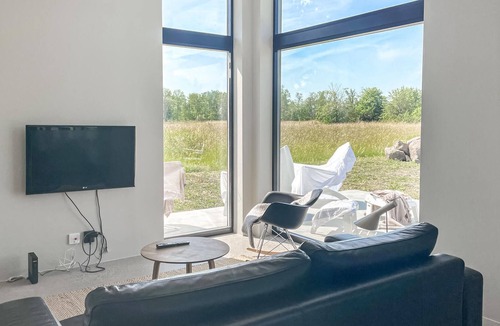 Sodvik House | Just one kilometer from the water, this modern and cozy cottage with a view of the Swedish nature aw