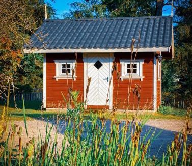 Skien House | Koselig hytte langs elven
