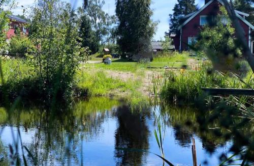 Skien House | Koselig hytte langs elven