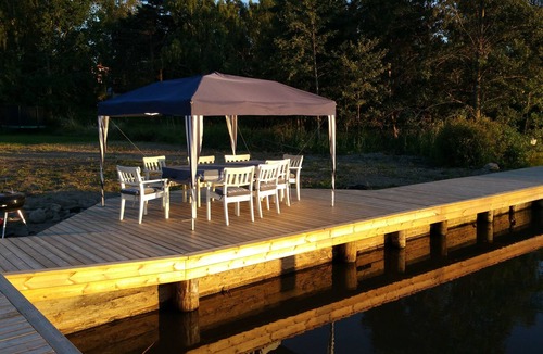 Lagersberg House | Lakefront cottage with private dock, boat, sauna and large garden with barbecue area
