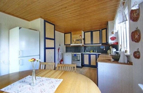 Lagersberg House | Lakeside cabin with a private dock, boat, sauna, and large garden with a barbecue area