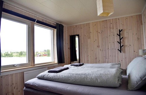 Skaulo House | Lakeside cottage in Lapland with great view