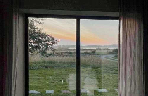Sodvik House | Limestone barn overlooking the strait on Öland