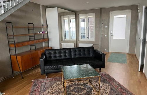 Kaakkoinen District Apartment | Loft with a sea view