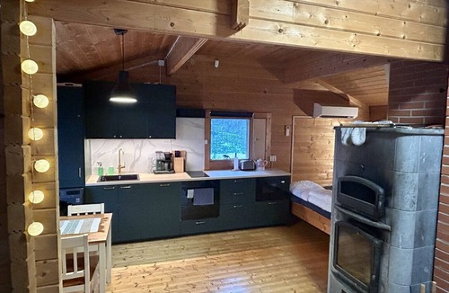 Rautavaara Cabin | Log cabin by the lake in Finland: 2 wooden saunas, hot tub, private beach