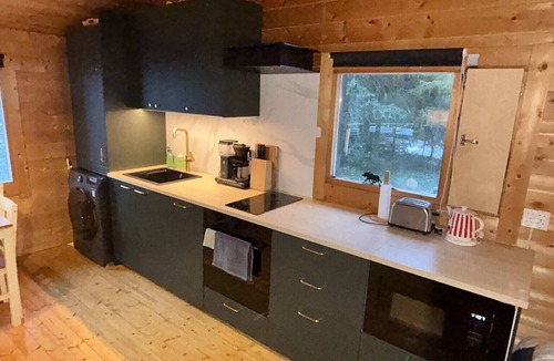 Rautavaara Cabin | Log cabin by the lake in Finland: 2 wooden saunas, hot tub, private beach