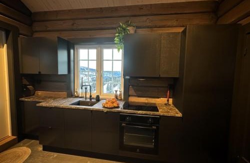Sogndal House | Log cabin in Hodlekve with mountain view