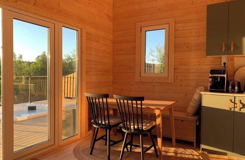 Ludvigsborg Cabin | Log cabin with hot tub and views
