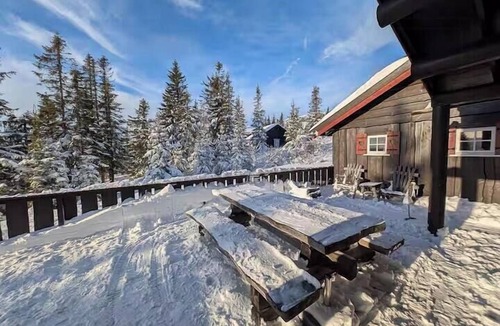 Svingvoll House | Log cabin with panoramic views at Skeikampen