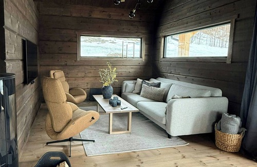 Bjorli House | Log cabin with ski in/out at Bjorli