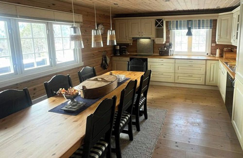 Rauland House | Log cabin with turf roof near Rauland