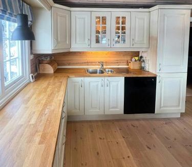 Rauland House | Log Cabin With Turf Roof Near Rauland