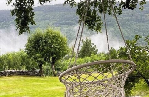 Austbygde House | Log cabin with view of Gaustatoppen