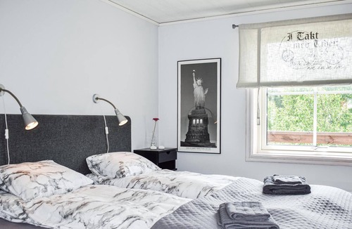 Soderkoping House | Look forward to a lovely vacation in this appealing vacation home with outdoor hot tub.