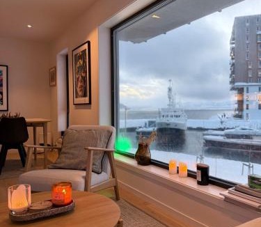 Tromso Apartment | Luxury Panorama Apartment by the Sea with Northern Lights View