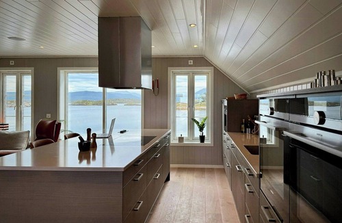 Averoy Municipality House | Maritime home with marina by the Atlantic Road