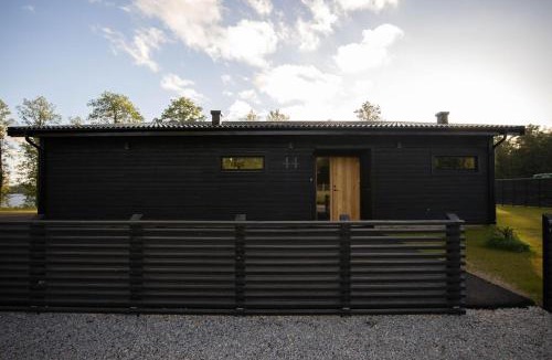 Ryssby Villa | Modern boende med sjöutsikt