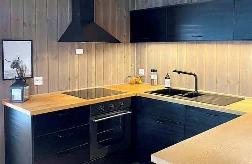 Møre og Romsdal House | Modern cabin with jacuzzi in The Sunnmøre Alps