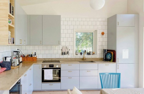 Nashagen House | Modern glass house with a view over Lake Lejondal