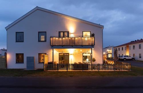 Bastad House | Modern Ground Floor Corner Flat with Rustic Patio