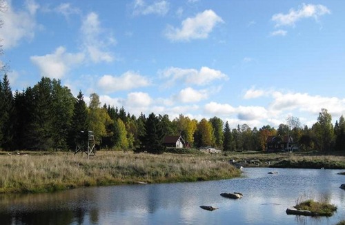 Ryd House | Modern holiday home with sauna, hot tub for bathing and trout pond in Småland