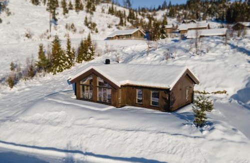 Nord-Aurdal Villa | Moderne hytte med badstue - ski-in & ski-out
