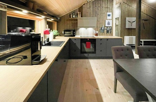 Suldal House | Mountain cottage with panoramic views by Sand