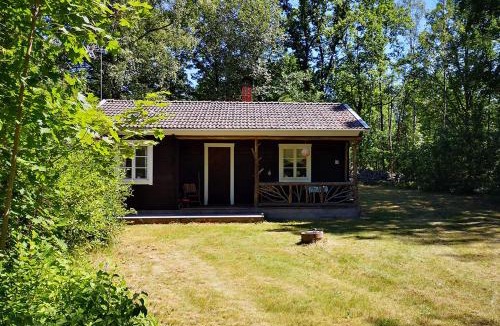 Froseke House | Mysig stuga med öppen spis och uteplats