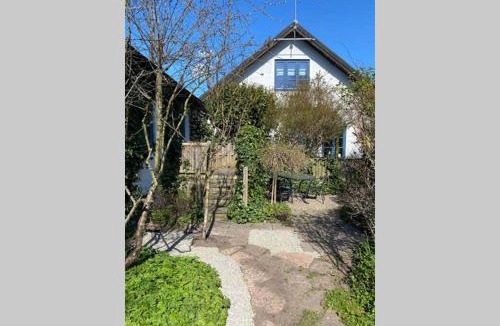 Abbekas House | Mysigt gästhus med cykelavstånd till havet!