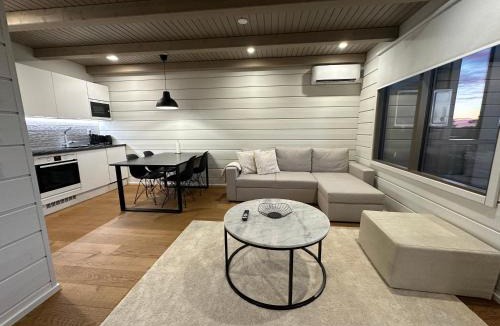 Ahtari Apartment | Naava Chalet 302 - Cozy apartment with lake view and Sauna