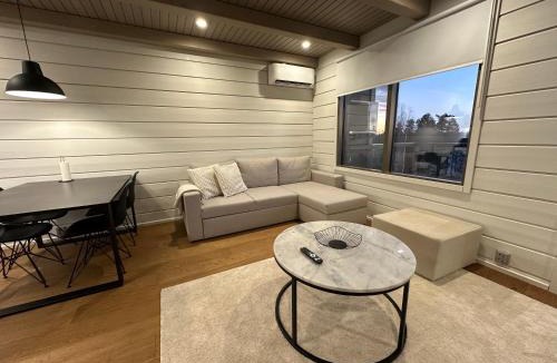 Ahtari Apartment | Naava Chalet 302 - Cozy apartment with lake view and Sauna