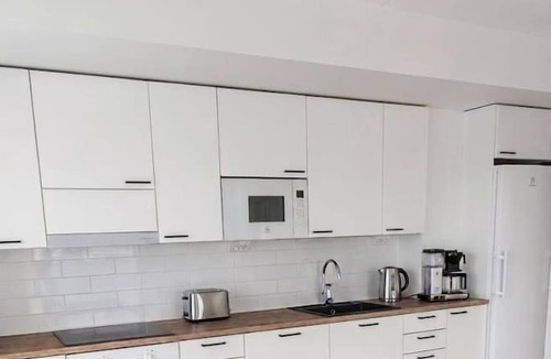 Jyvaskyla Apartment | New 11th Floor 2BR Apt in Centre | Hot Tub & Sauna