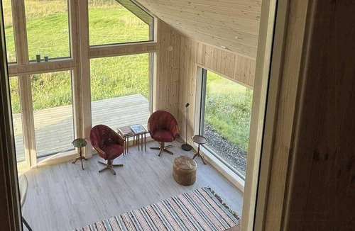 Andoy House | Newly built cabin on Andøya with northern lights